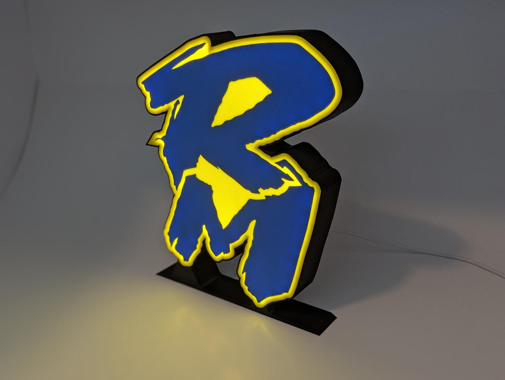 Suzuki RM lightbox showing the retro logo detail
