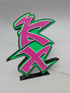 Kawasaki KX 3D printed LED sign illuminated in a dark room