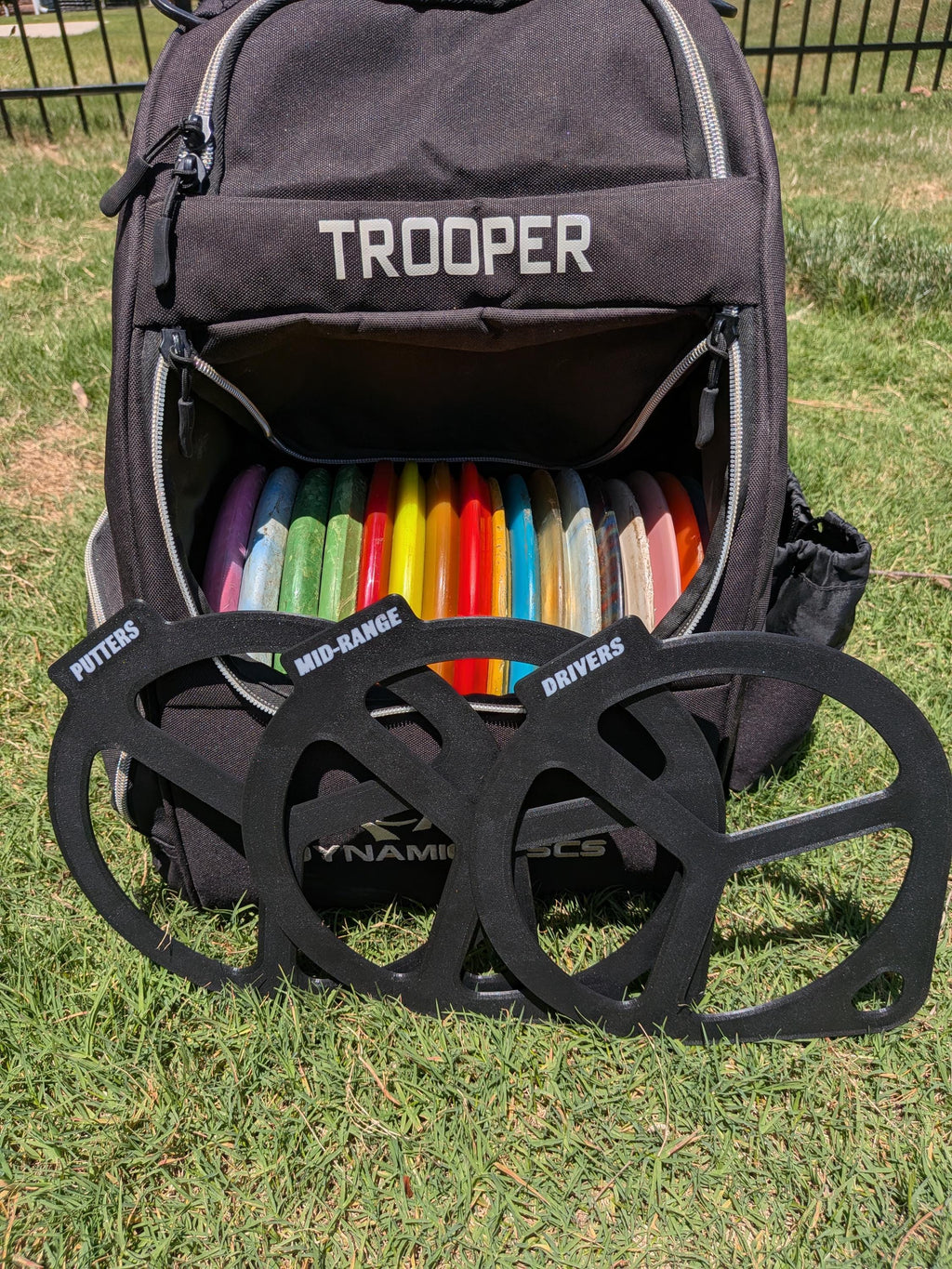 Disc golf bag dividers keeping discs organized in a bag